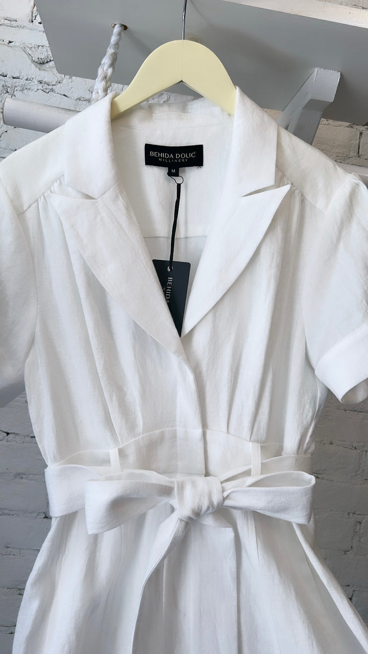 White linen jumpsuit with pleated bust detail and lapel